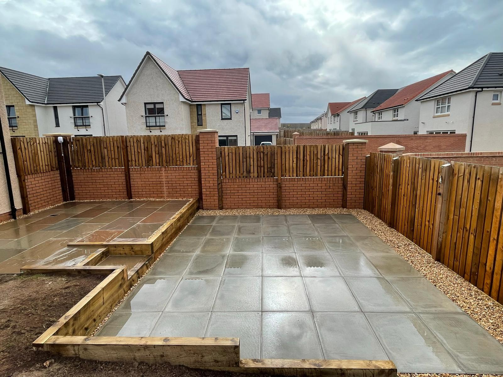 Paved garden with sleeper walls